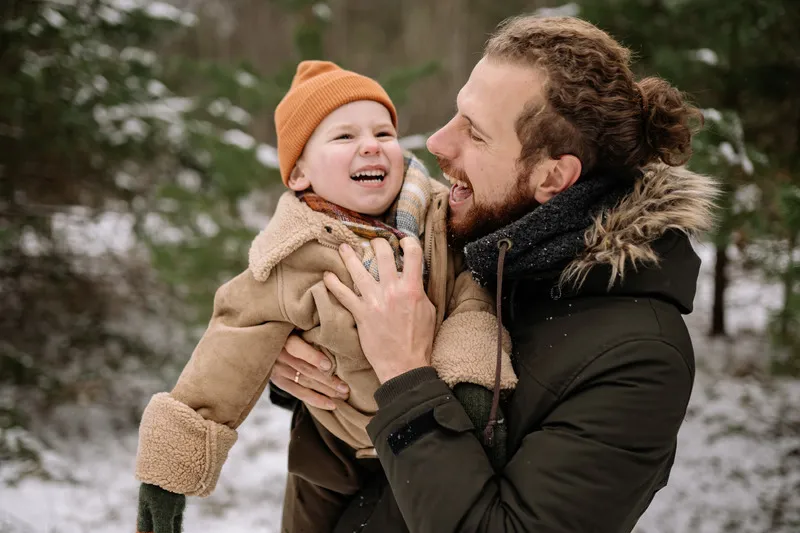 A man holding a baby